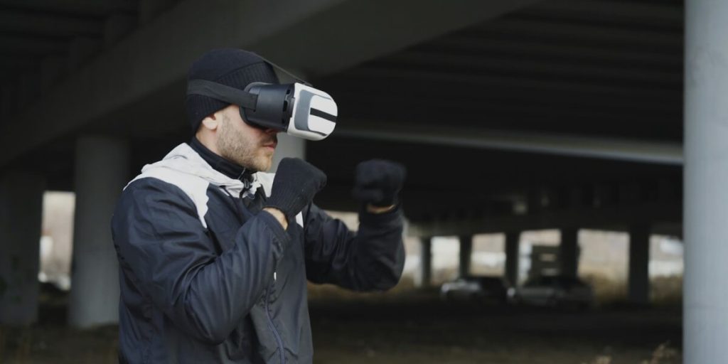 A Man Wearing Virtual Reality Glasses